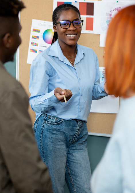 lady standing in from of board